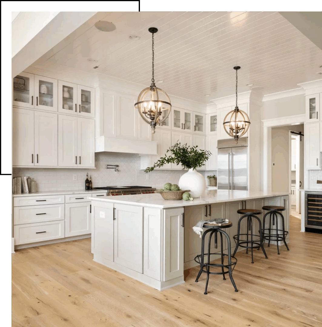 Spacious kitchen with wooden floors and decor.