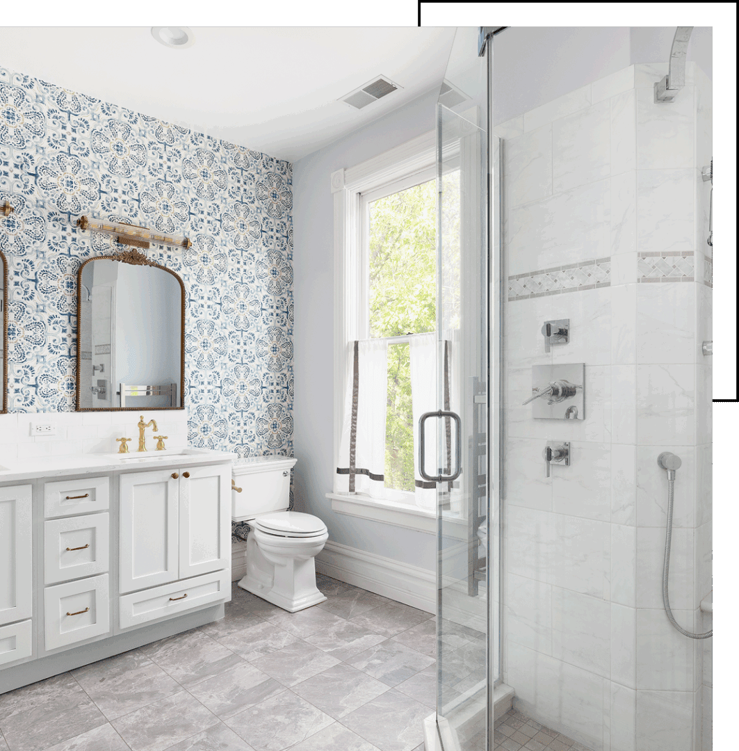 Bathroom with double sinks and large window