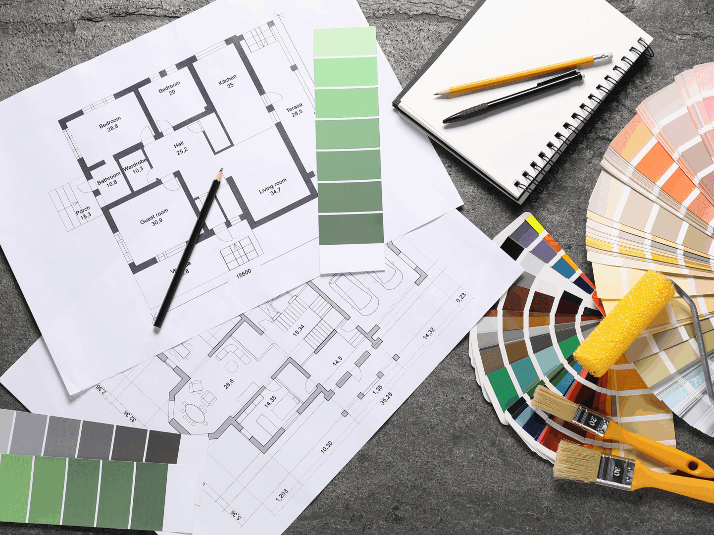 Floor plans and color samples on table
