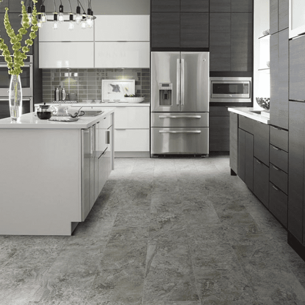 Modern kitchen with sleek black and white cabinetry and stainless steel appliances.